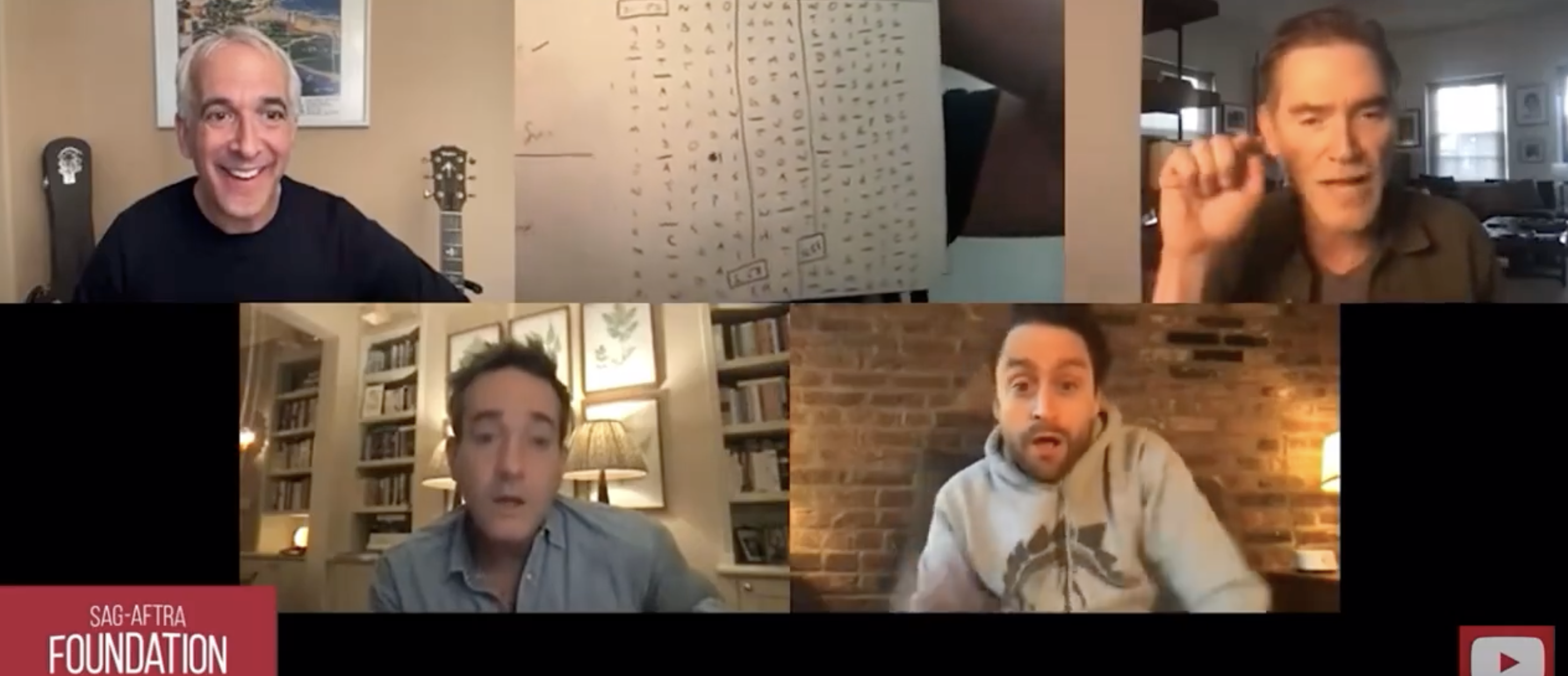 The men in a virtual meeting, with individual home backgrounds, engaging in a discussion