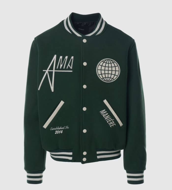 Varsity jacket with embroidered patches and text, button-up front, and ribbed collar