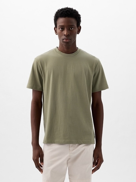model wearing green short sleeve T-shirt