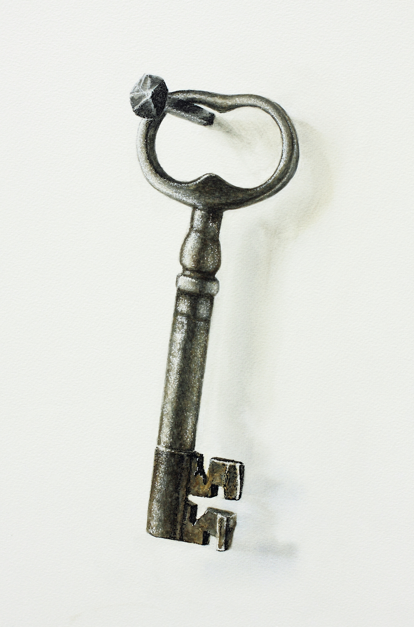 Vintage skeleton key against a plain background