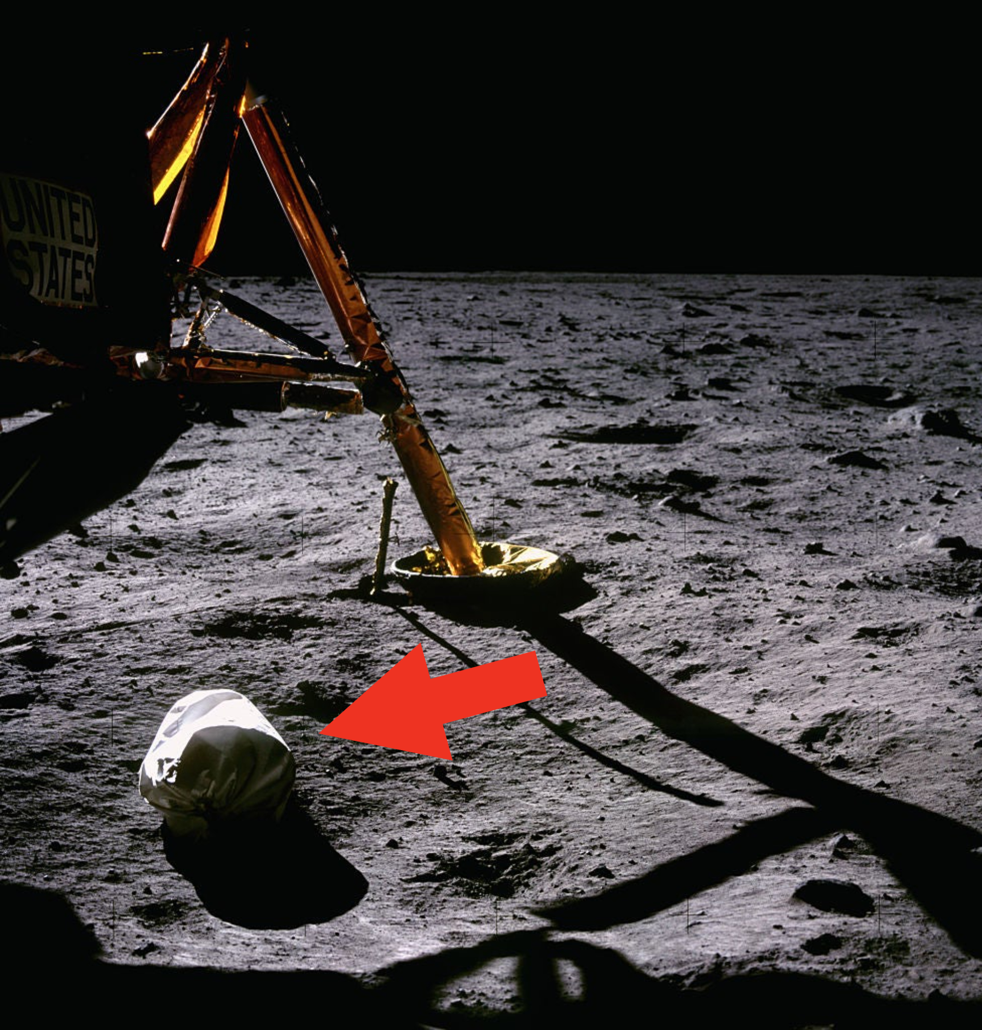 Apollo lunar module leg and astronaut&#x27;s footprint on the moon&#x27;s surface