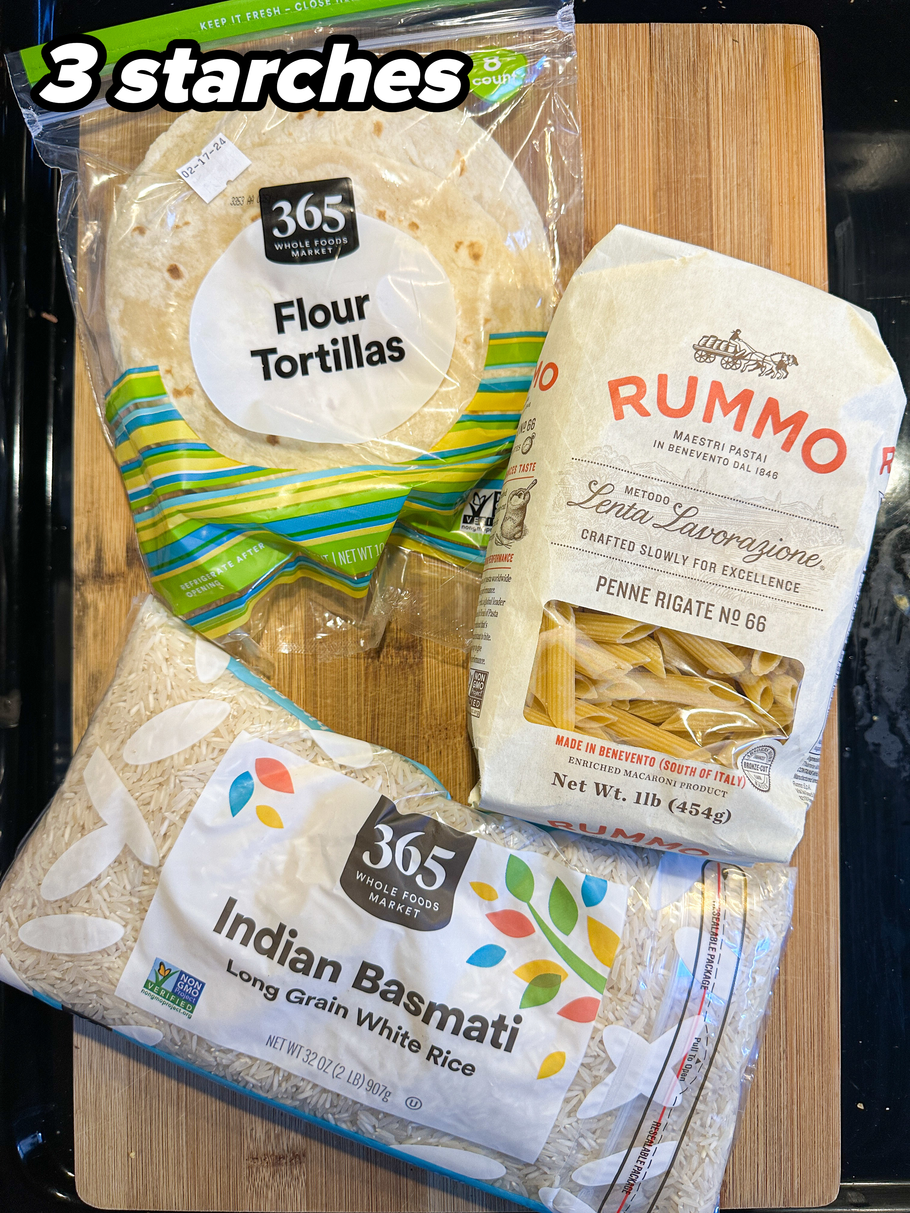 Packages of flour tortillas, Rummo pasta, and Indian Basmati rice on a countertop