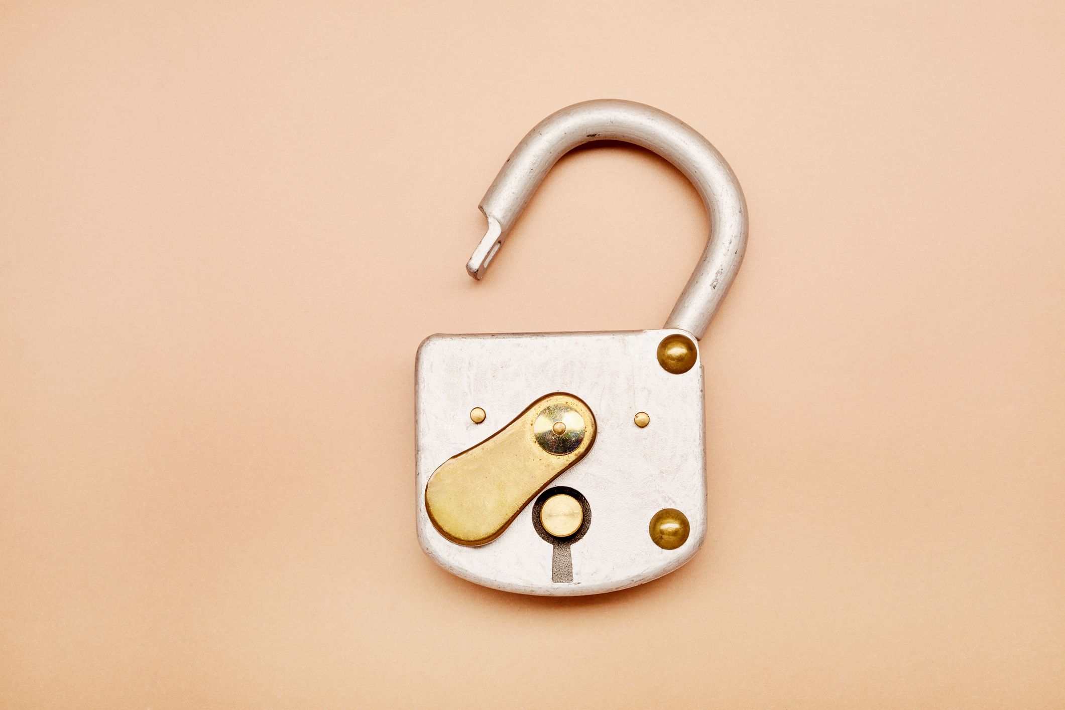 Open padlock on a plain background