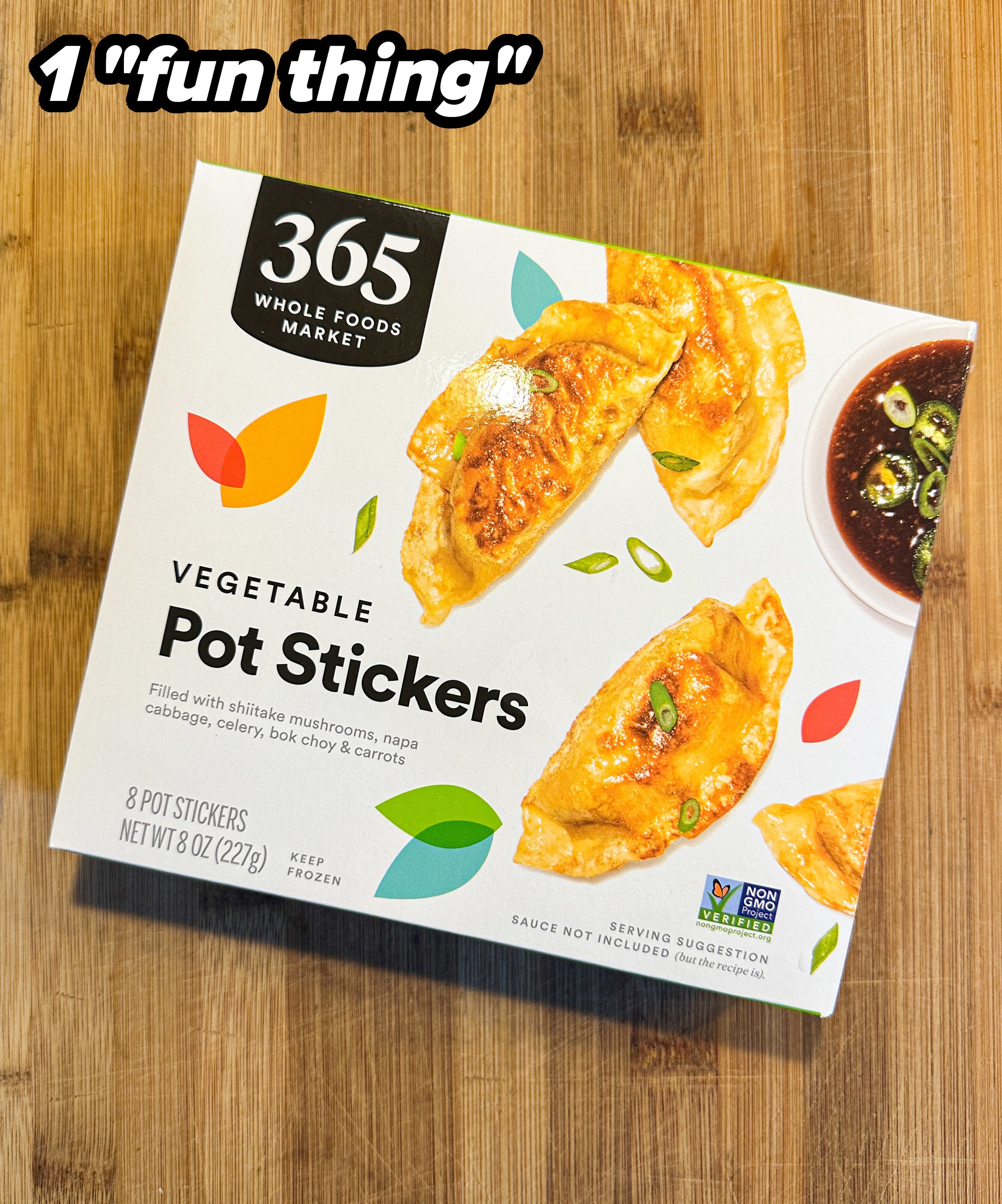 Package of 365 Whole Foods Market Vegetable Pot Stickers on a wooden surface