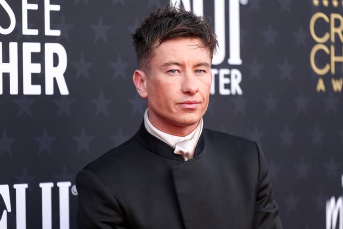 Barry Keoghan in a black suit and tie