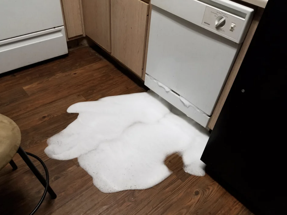 soap leaking from a dishwasher