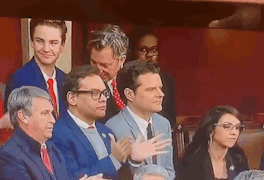GIF of George just tapping his palms together