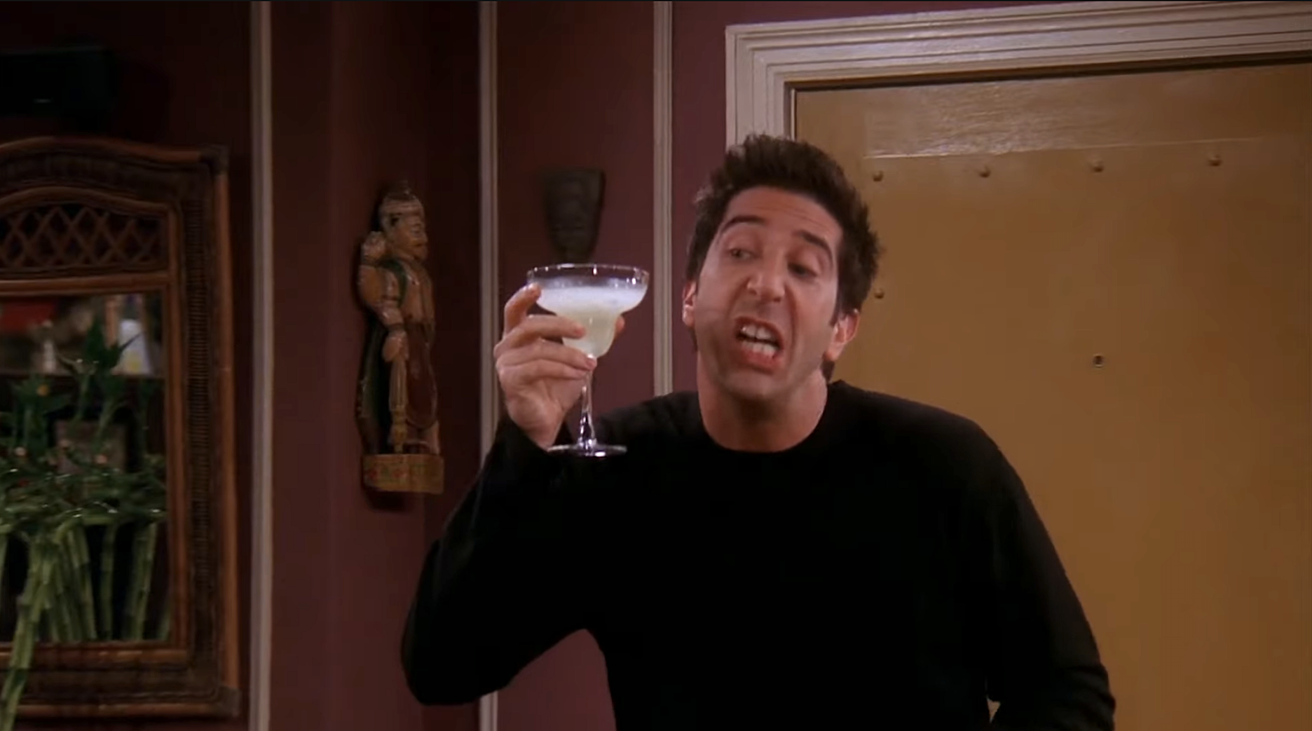 Screenshot from &quot;Friends&quot; of Ross holding a margarita