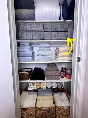 reviewers linen closet with organizing cubes in them