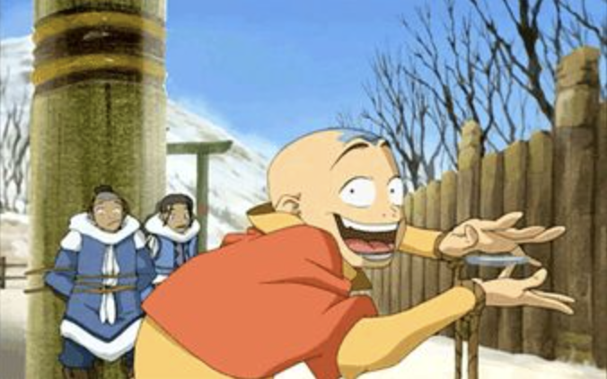 Aang from Avatar: The Last Airbender in a playful stance with Katara and Sokka in the background