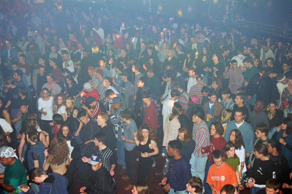 Crowded dance floor with people enjoying a party