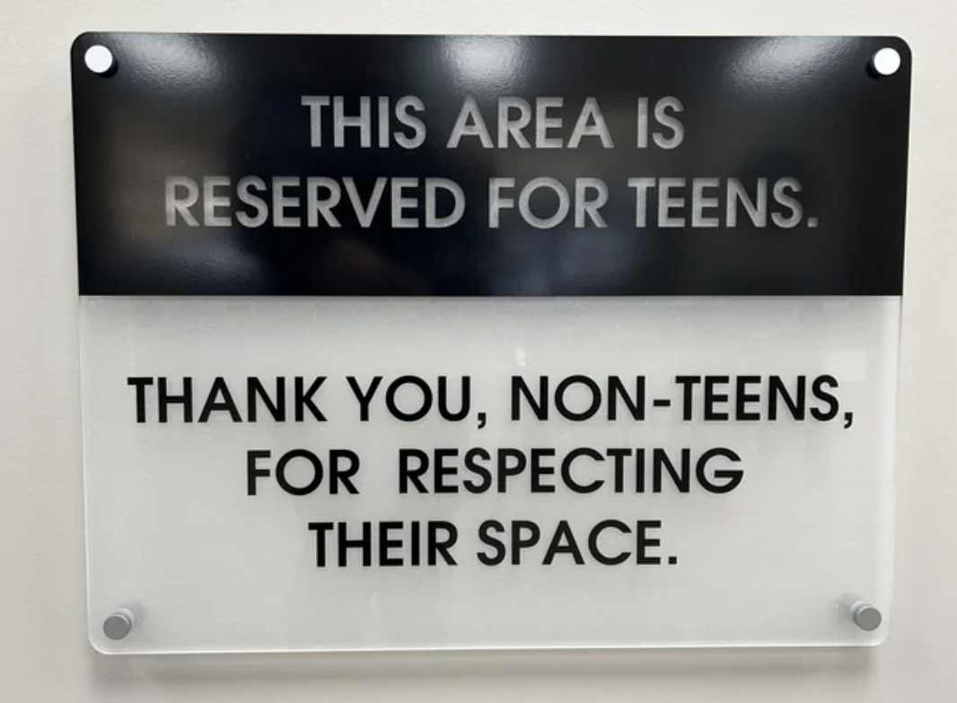 Sign indicating a space reserved for teens, thanking non-teens for respecting this