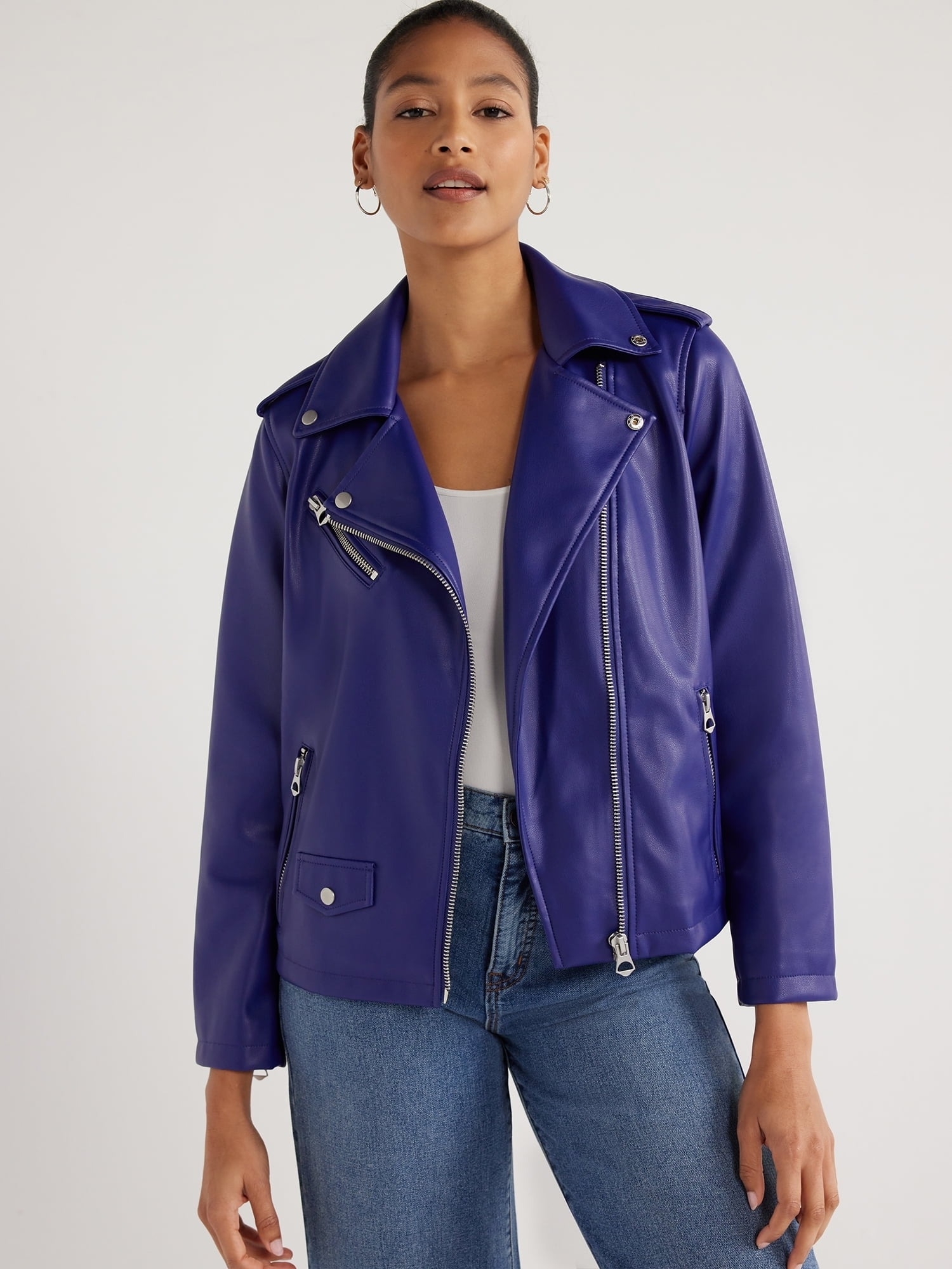 model in a blue purple leather jacket and jeans, showcasing a casual yet stylish outfit