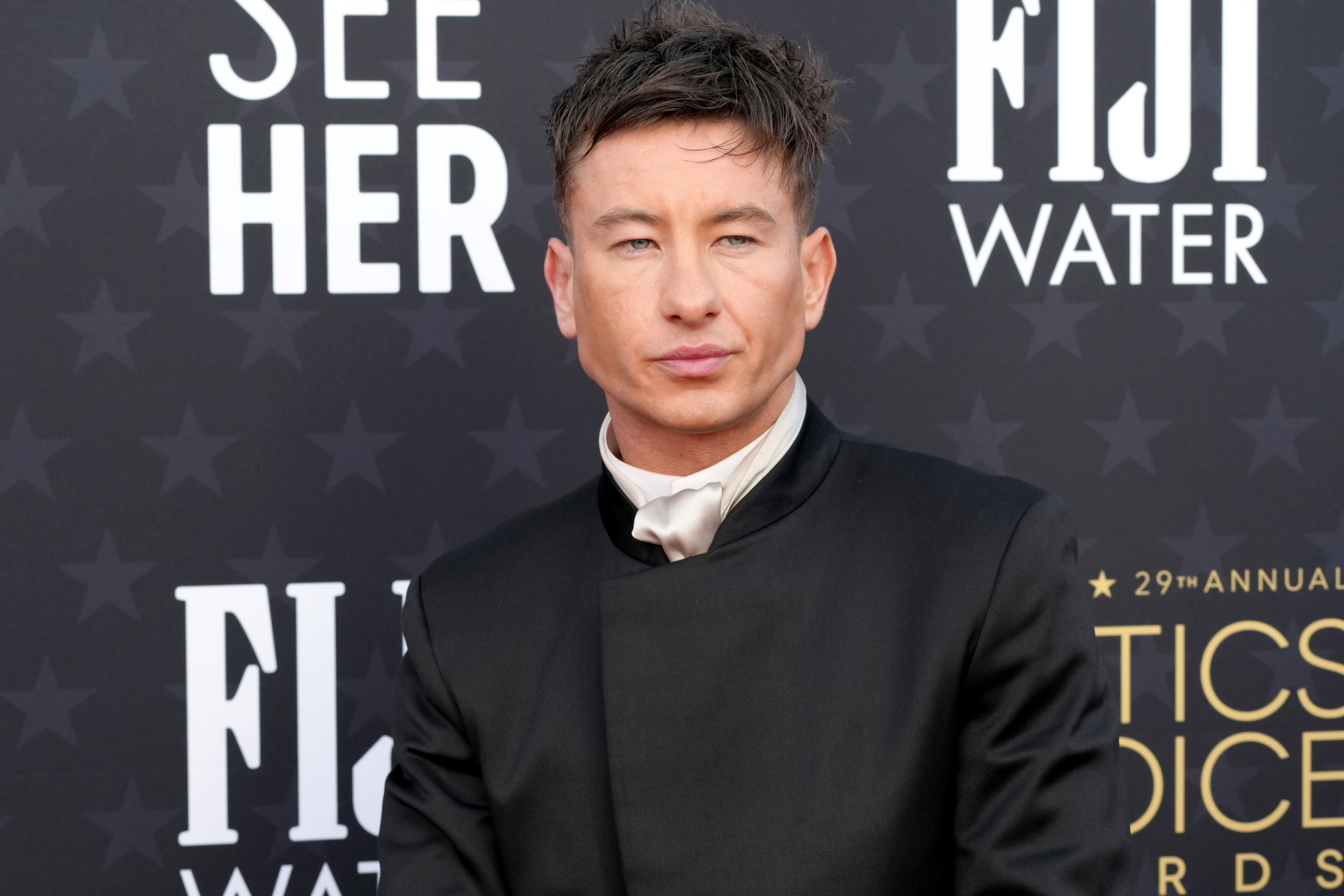 Barry Keoghan in formal black attire with a high-neck top at the Critics&#x27; Choice Awards