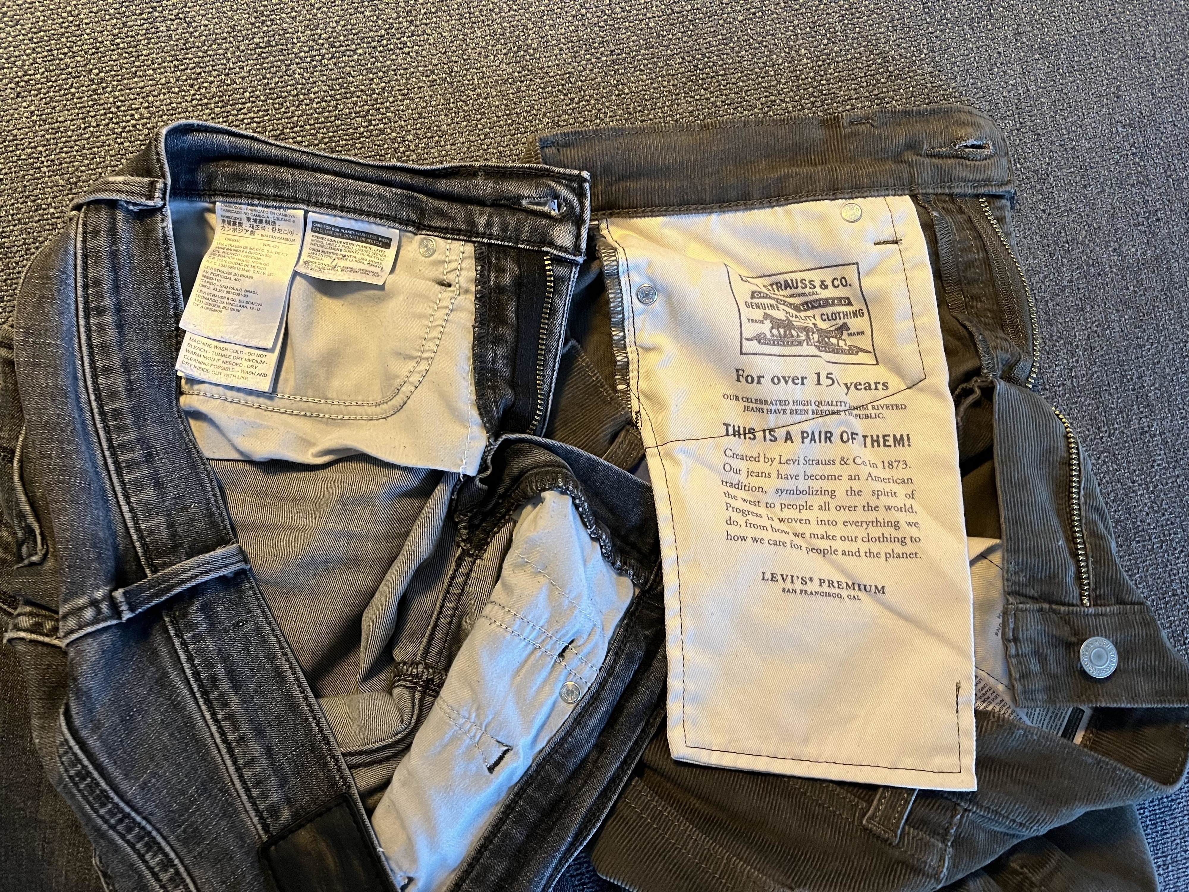 Close-up of a pair of jeans with the inside pocket visible, displaying care instructions and Levi&#x27;s branding