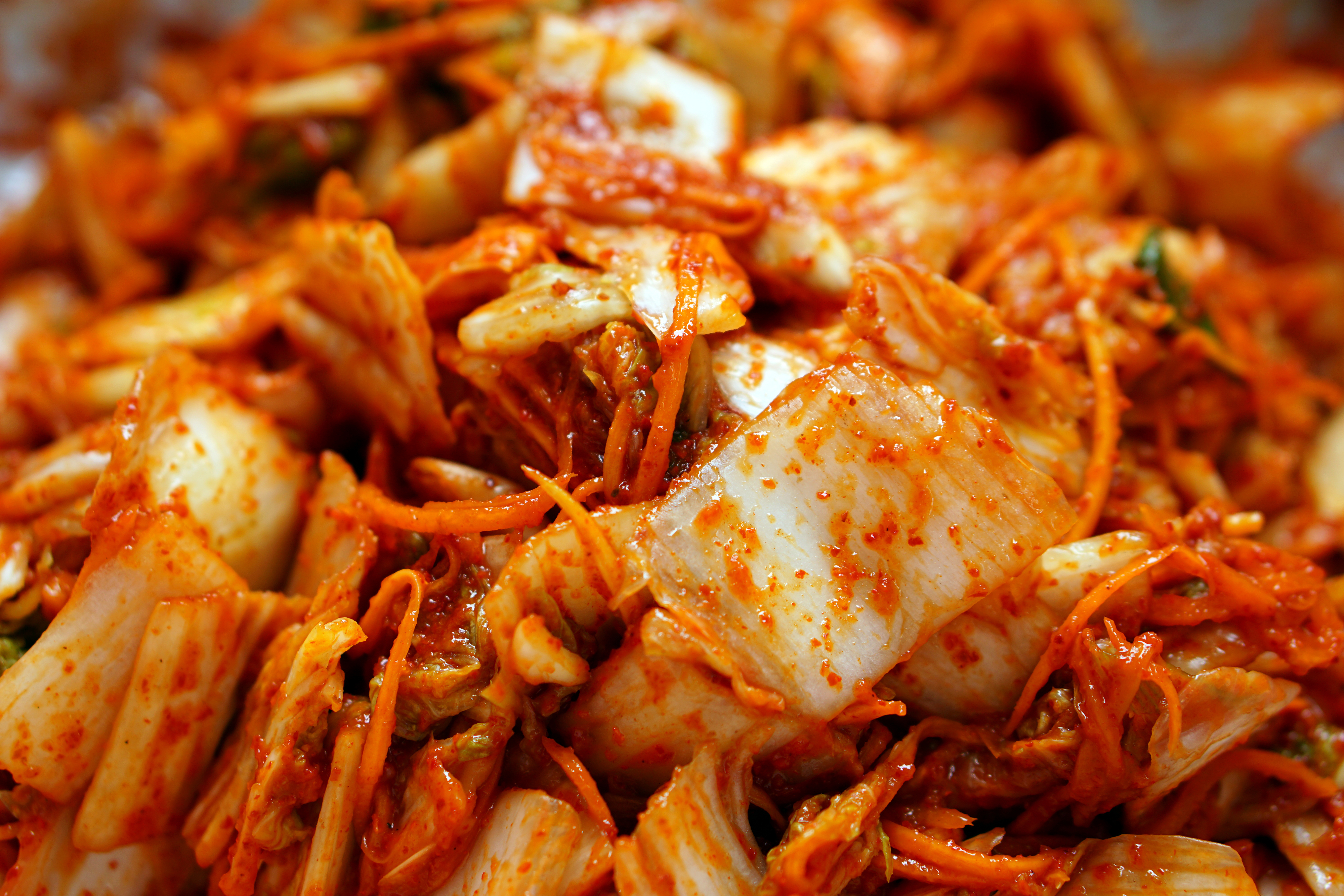 Close-up of freshly made kimchi, showcasing its ingredients and texture