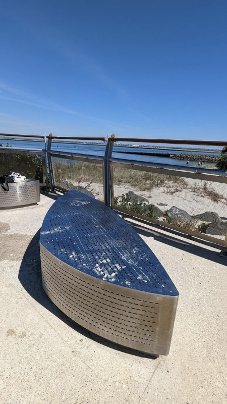 Semi-circular outdoor metal bench