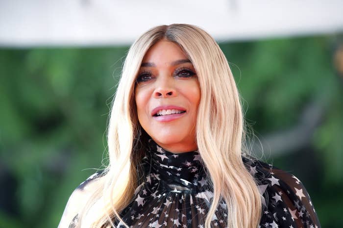 Wendy Williams in a high-neck, star-patterned outfit