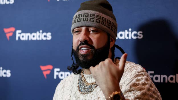 French Montana gives thumbs-up at Fanatics event
