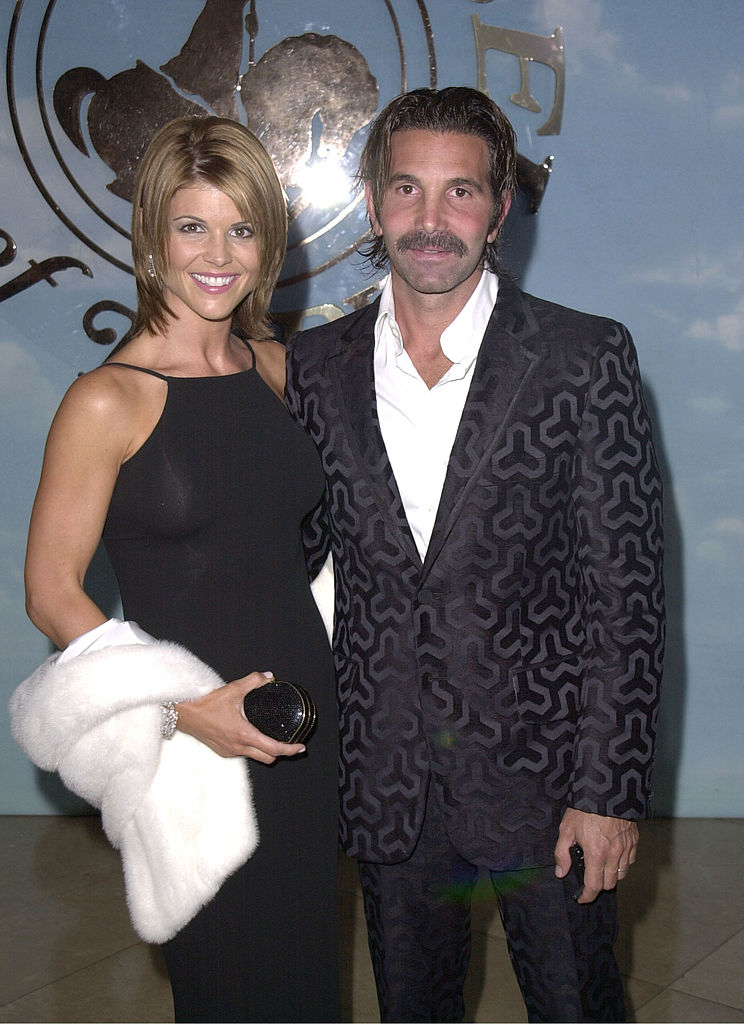past photo of mossimo and lori at an event