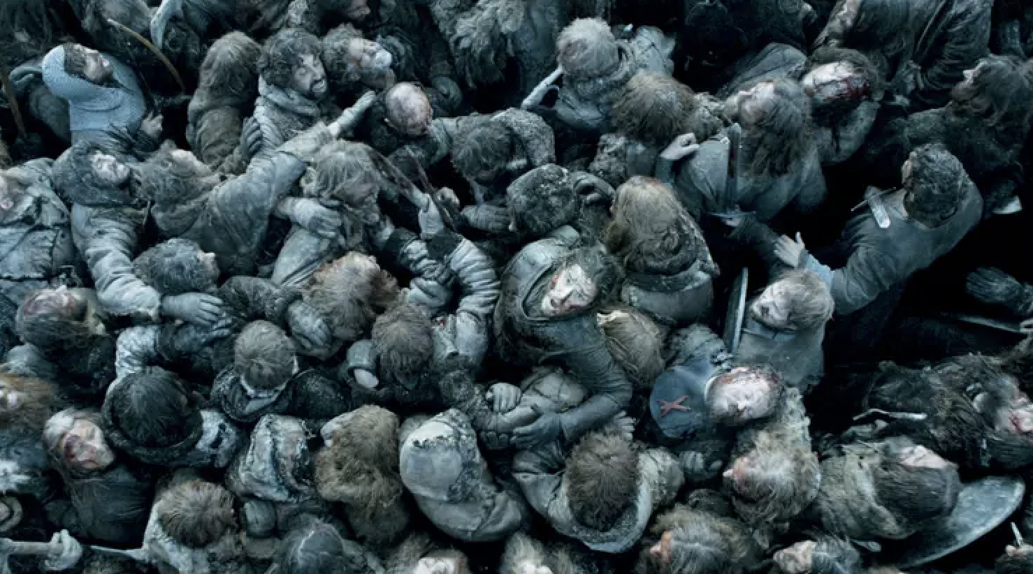 A dense crowd of characters from the show &quot;Game of Thrones&quot; engaged in a battle scene