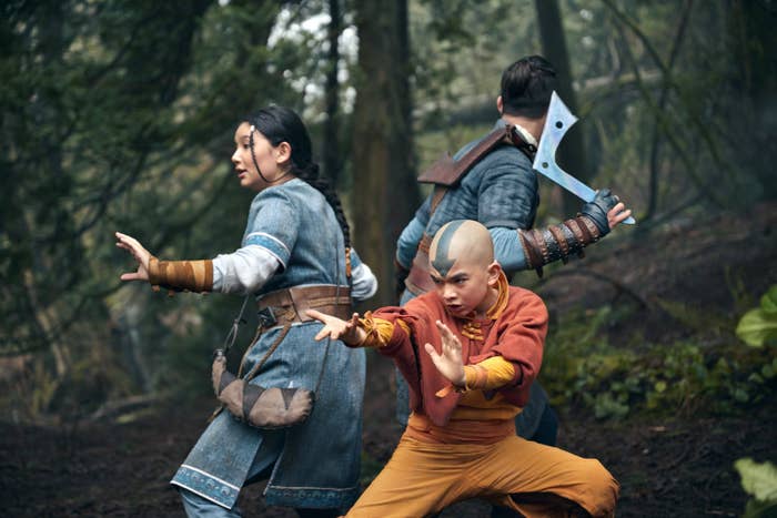Characters from live-action &#x27;Avatar: The Last Airbender&#x27; series in action poses with Aang in the foreground