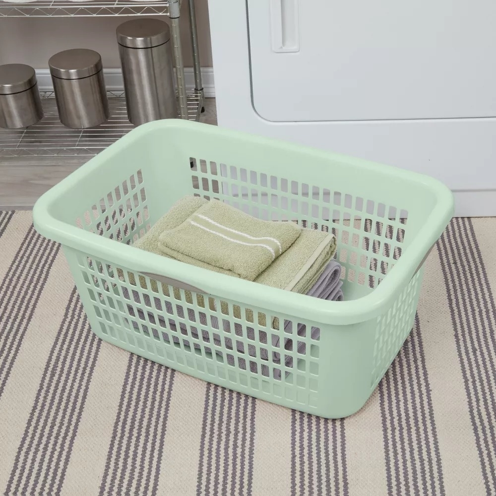 Laundry basket with towels, suitable for home organization