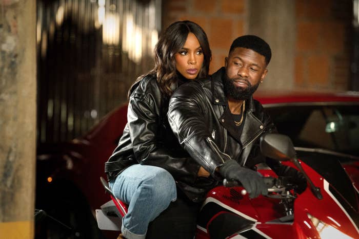 Man and woman duo on a motorcycle, both in leather jackets