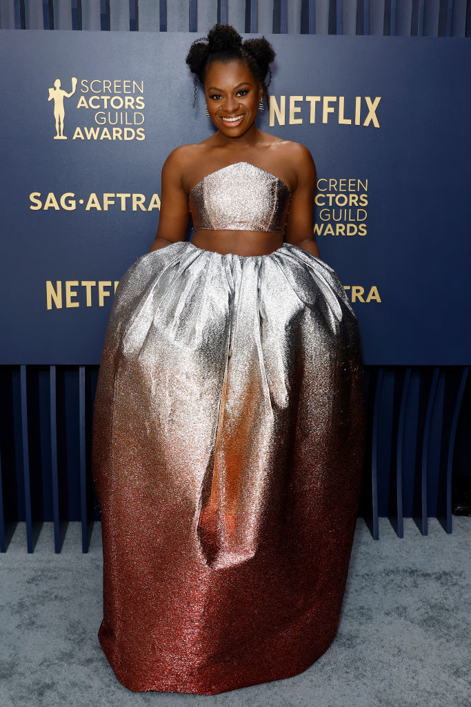 Phylicia Pearl Mpasi in a strapless metallic gown with a voluminous skirt
