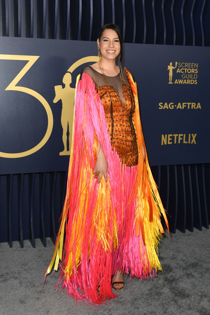 Cara Jade Myers in vibrant fringed gown