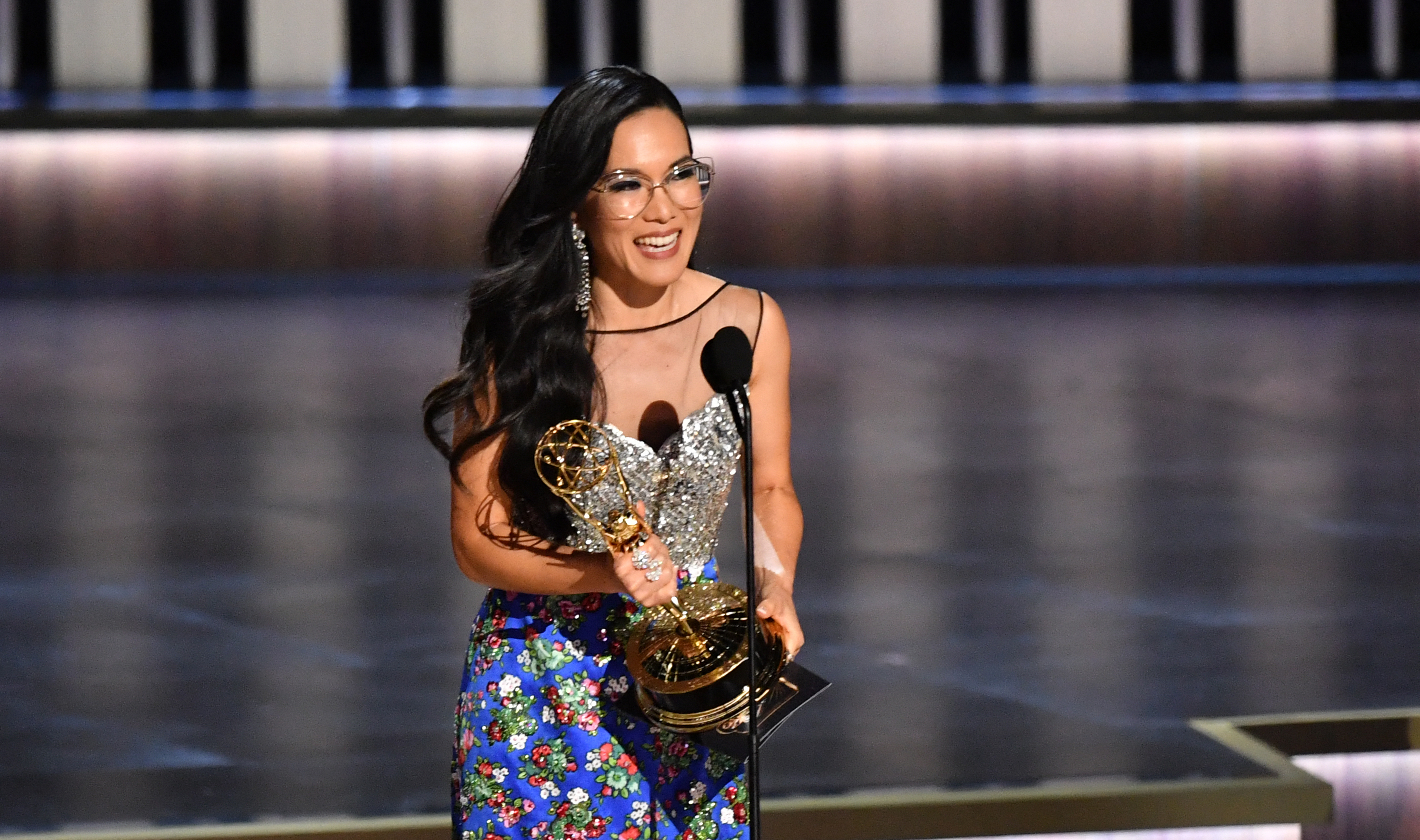 Ali Wong onstage accepting her Emmy award