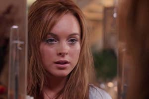 Lindsay Lohan looking into the mirror as seen in "mean girls" 