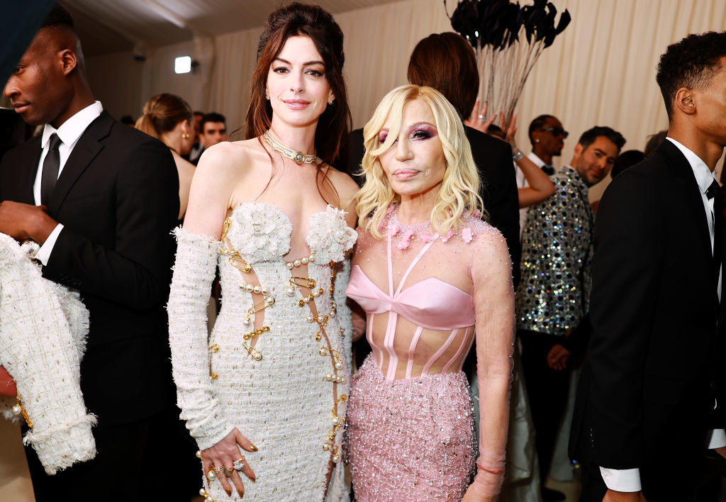 Closeup of Anne Hathaway and Donatella Versace