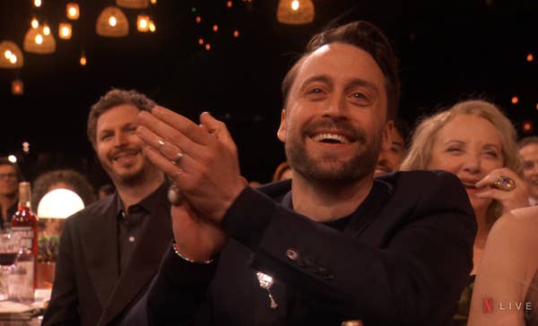 closeup of kieran clapping in the audience