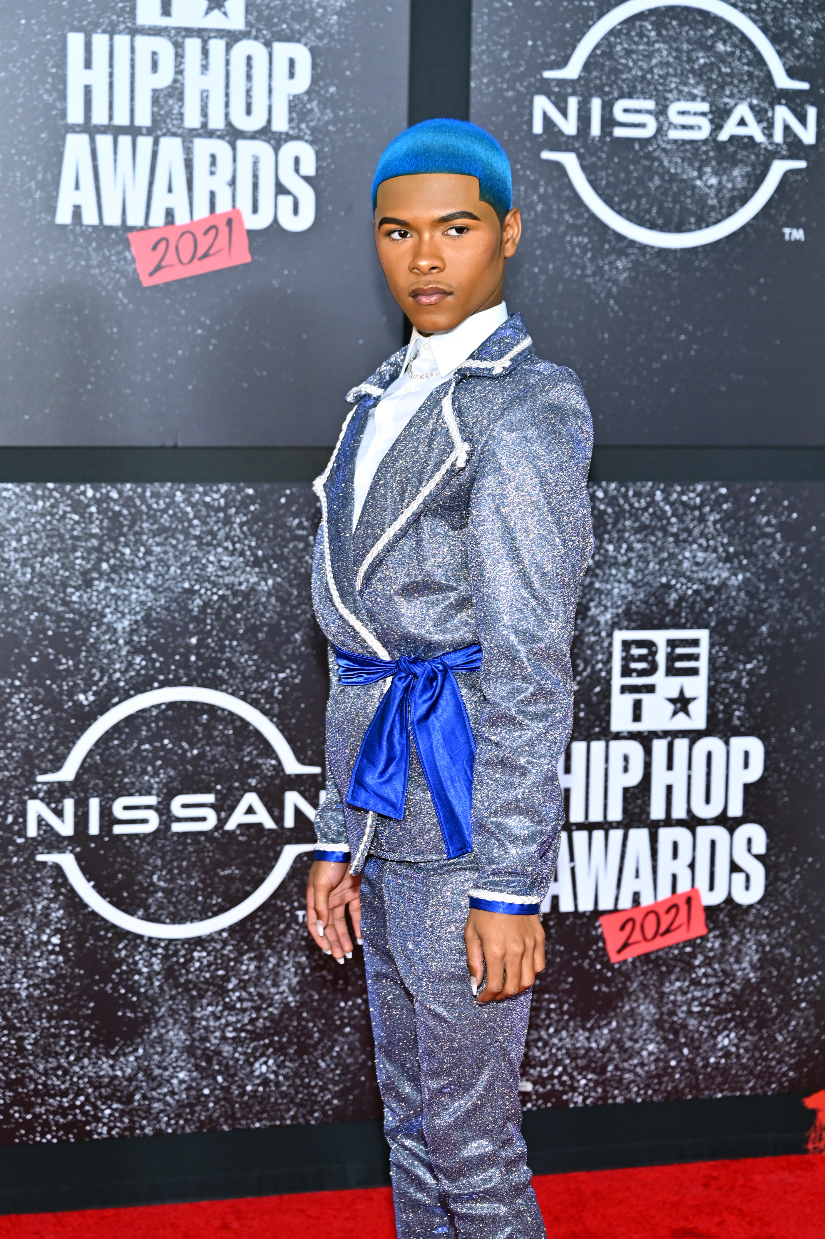 Kidd Kenn in a glittery suit at the 2021 BET Hip Hop Awards red carpet