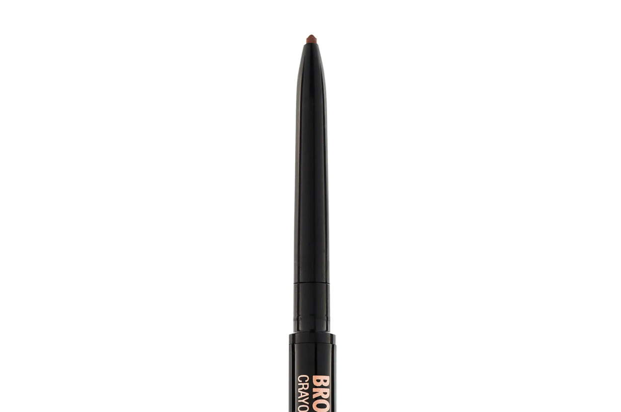 Eyebrow pencil with branding visible