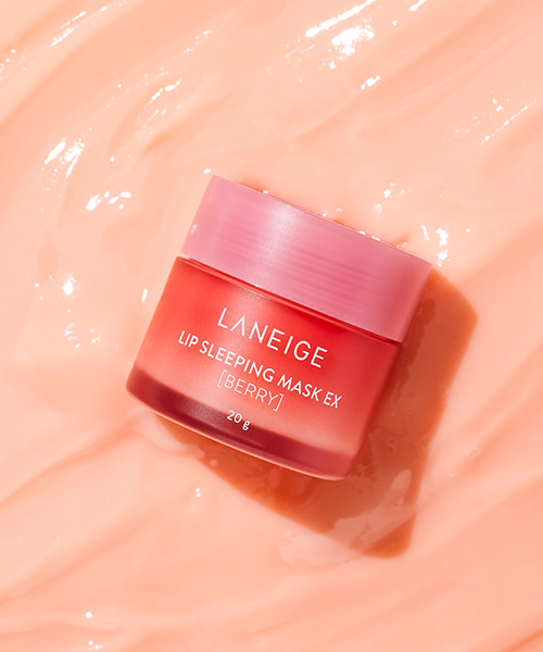 Laneige lip sleeping mask container on a creamy textured background. No people in the image