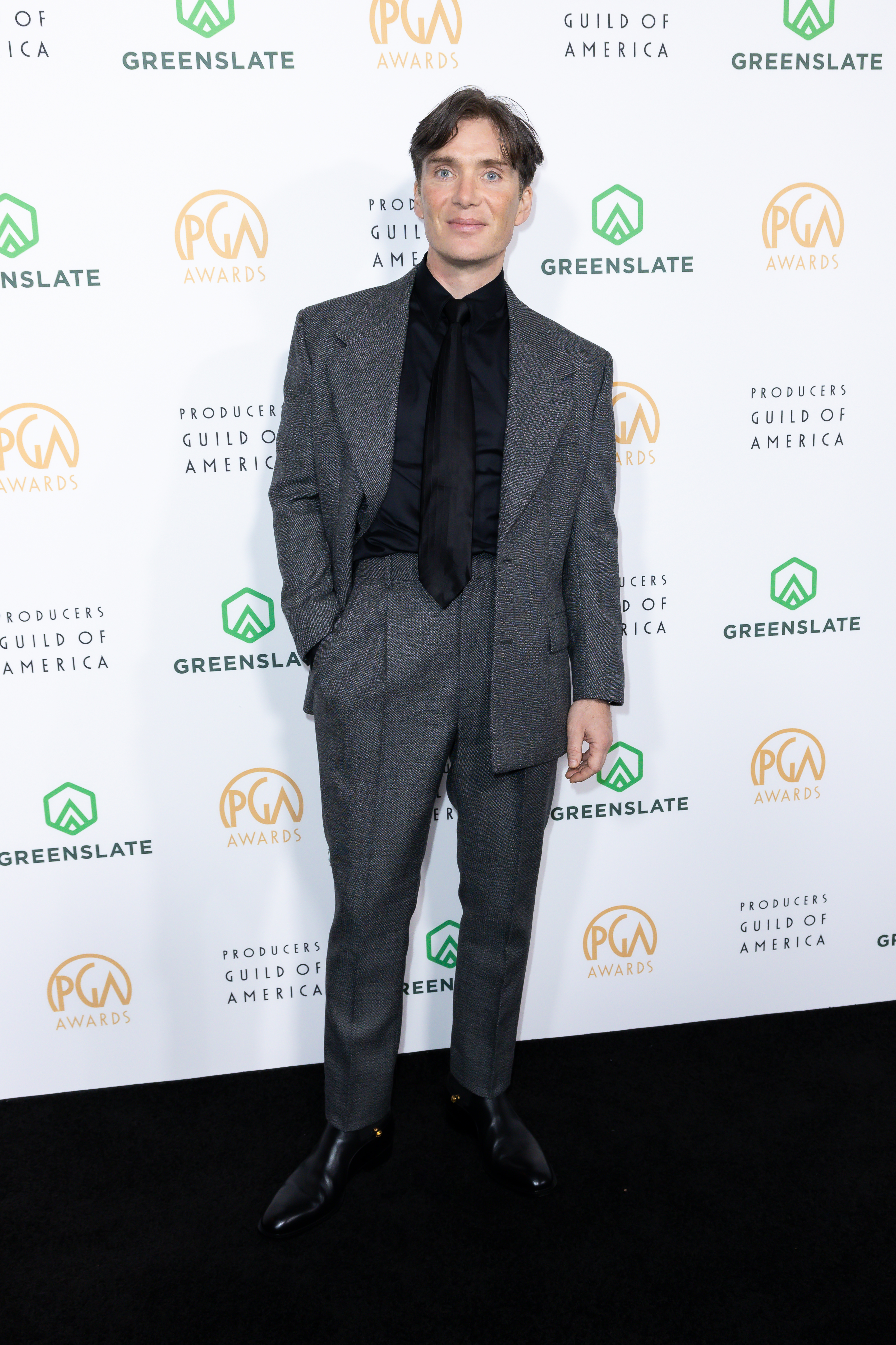 Cillian at event wearing a suit and tie