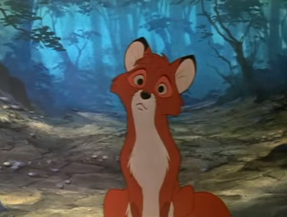 Animated character, Tod from &quot;The Fox and the Hound,&quot; looks forward with a surprised expression in a forest