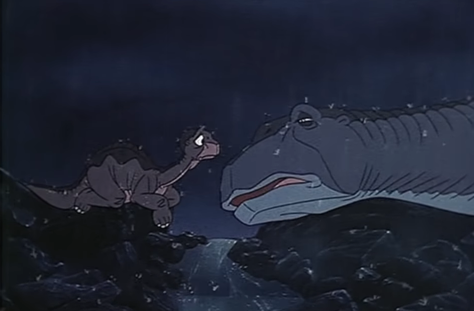 Littlefoot from &quot;The Land Before Time&quot; stares at his mother as she dies