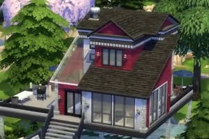 A small computer-generated Sims house with two stories sits riverside in a tree-filled neighborhood.