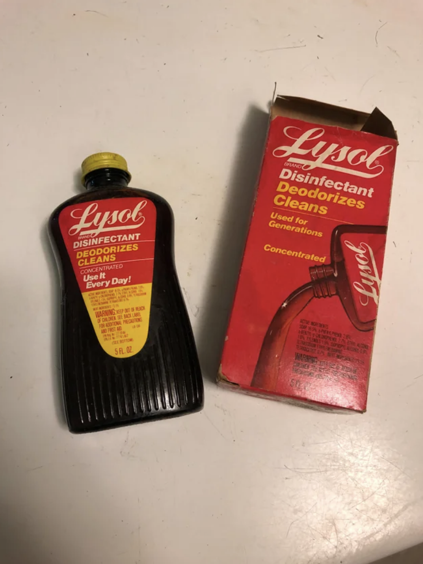 Bottle of Lysol disinfectant next to its vintage packaging, highlighting the brand&#x27;s design evolution