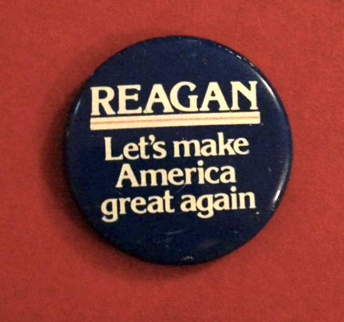 Button reads &quot;REAGAN Let&#x27;s make America great again&quot; on a navy background