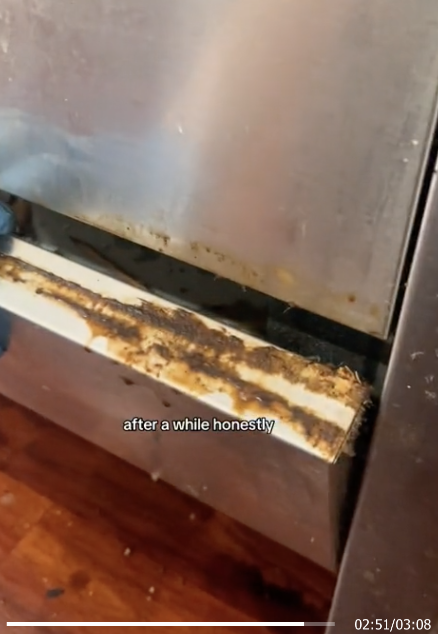 sticky grime on top of an oven section