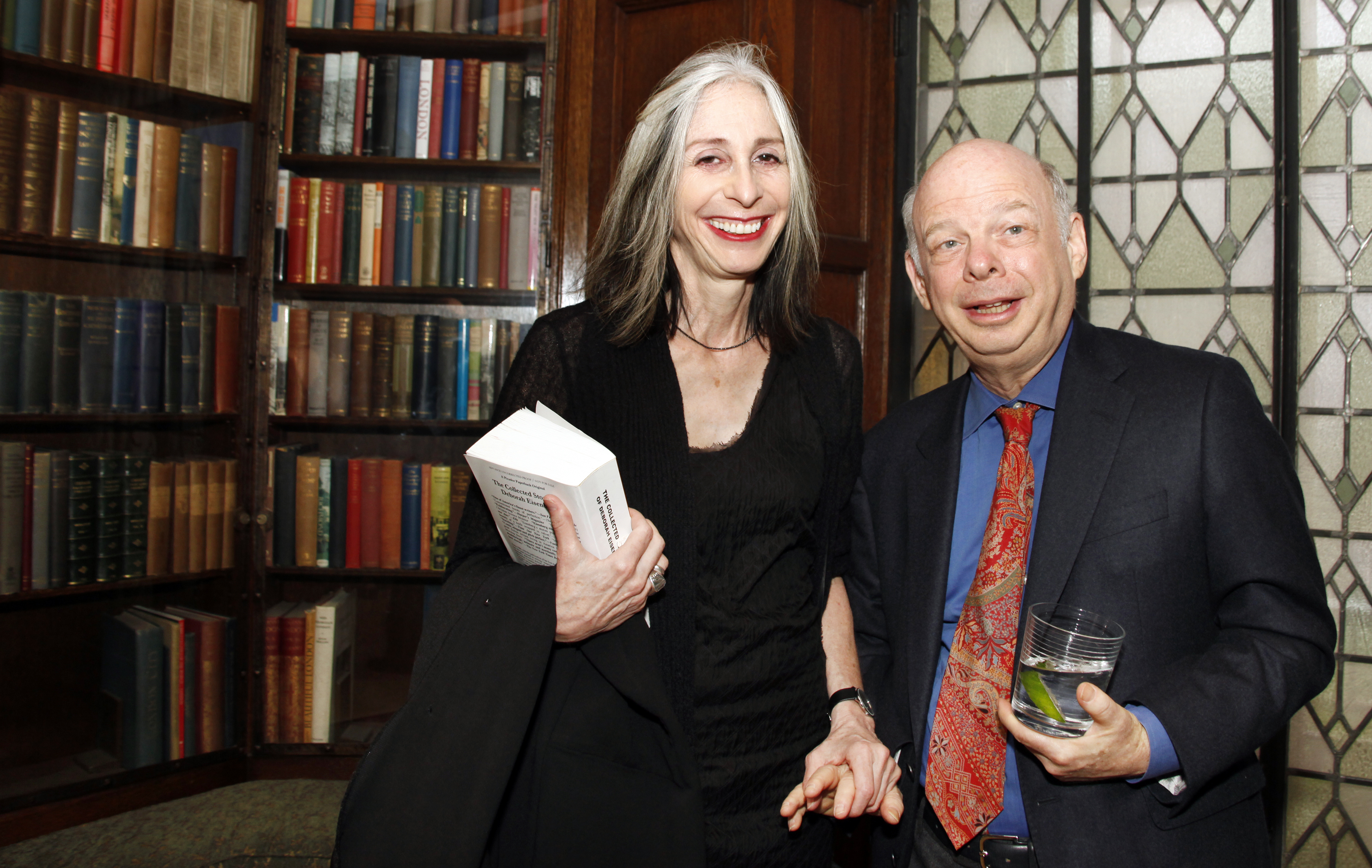 a photo of Wallace Shawn and Deborah Eisenberg in a library