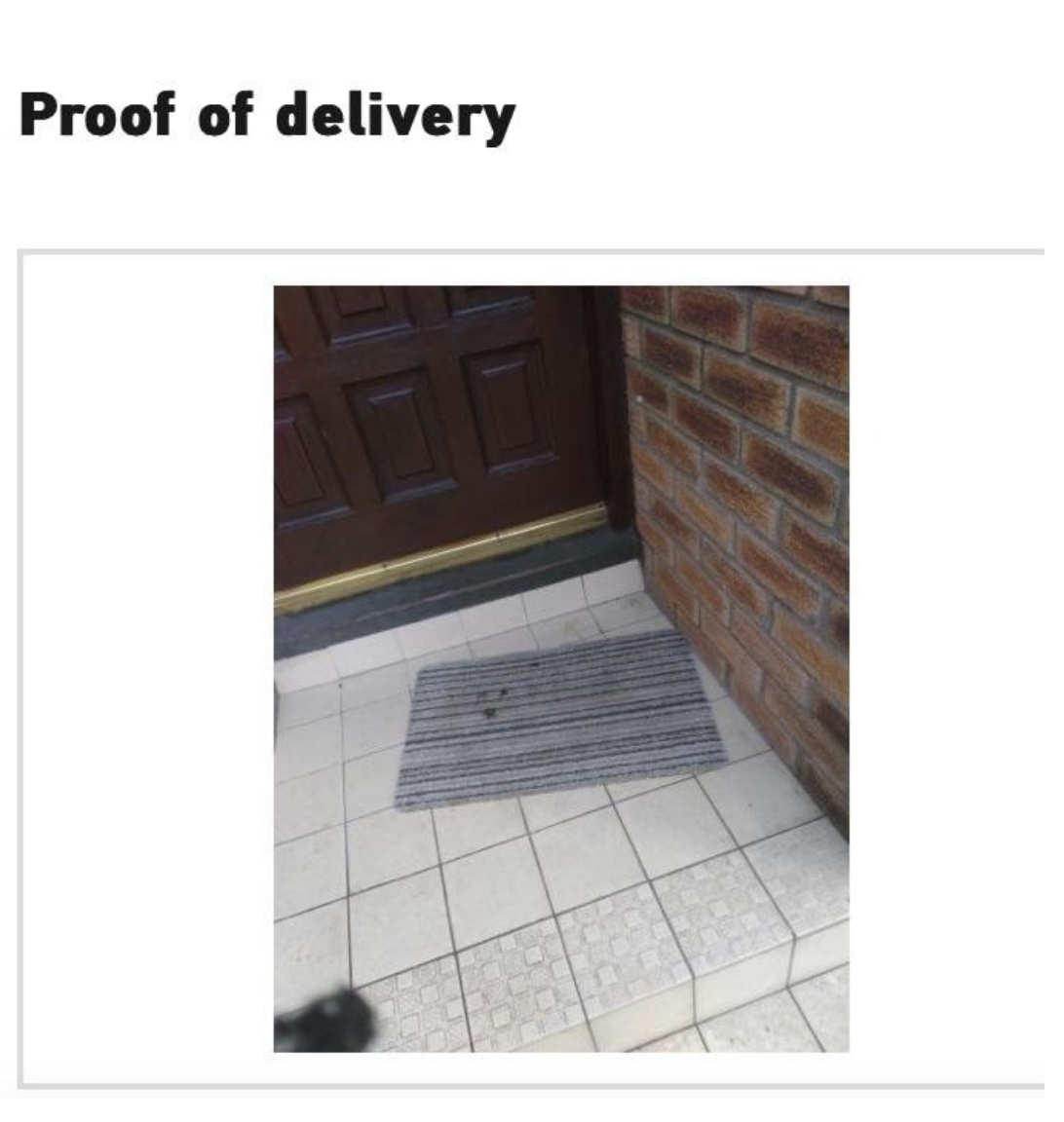 The image shows a doorstep mat with no package in sight, with the text "Proof of delivery" at the top