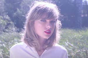Taylor Swift in a sunny field in the Style music video
