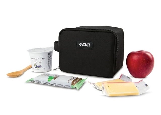 PackIt lunch bag with yogurt, apple, spoon, and snack bars indicates convenient food storage solutions