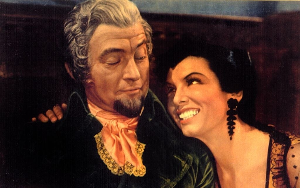Movie poster for &quot;Anthony Adverse&quot; with a man and woman in period costumes, both smiling