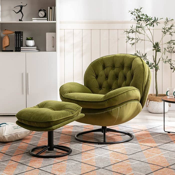 A plush green swivel chair with a matching ottoman in a cozy room setting